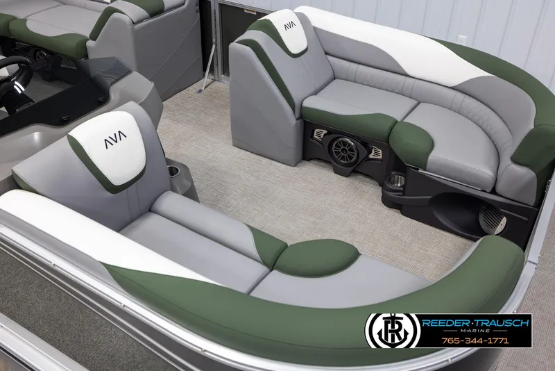Slide: The Image of 2025 Avalon LSZ CRB boat interior with green and gray seating, featuring AVA branding. - 9