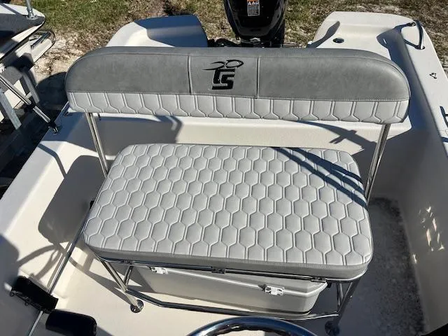 Slide: The Image of 2025 Carolina Skiff E16 JVX CC boat seat with hexagonal pattern upholstery. - 4