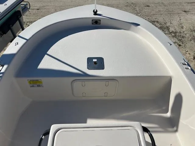 Slide: The Image of 2025 Carolina Skiff E16 JVX CC boat interior, featuring a spacious bow area. - 6