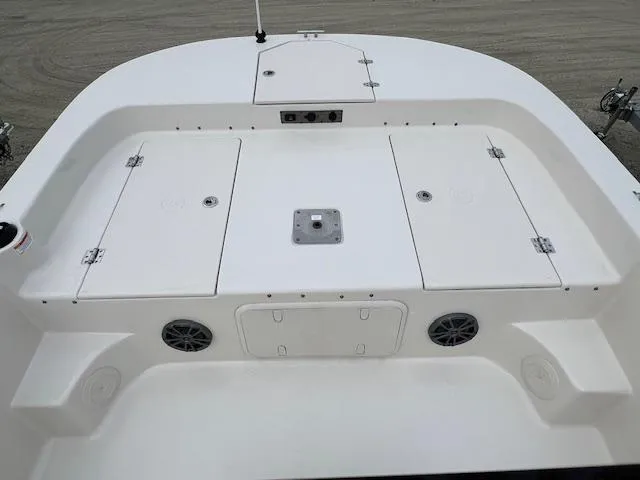 Slide: The Image of 2025 Carolina Skiff 17 LS boat deck with storage compartments and speakers. - 5