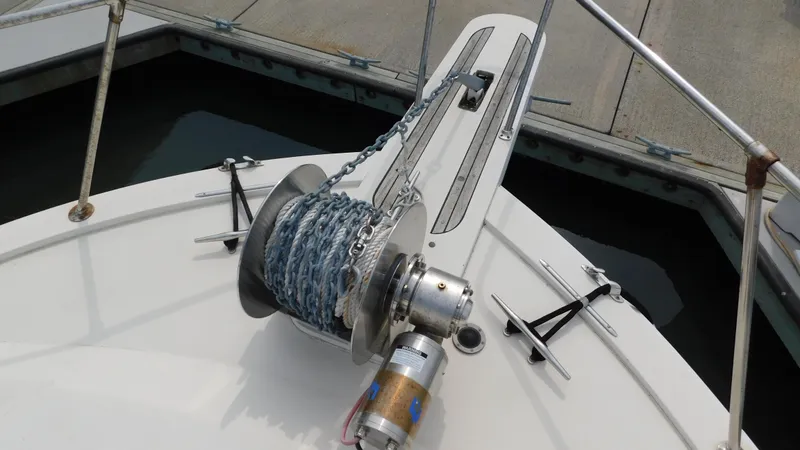 Slide: The Image of Anchor winch on 1986 Viking 35 Sportfish boat, docked at marina. - 32