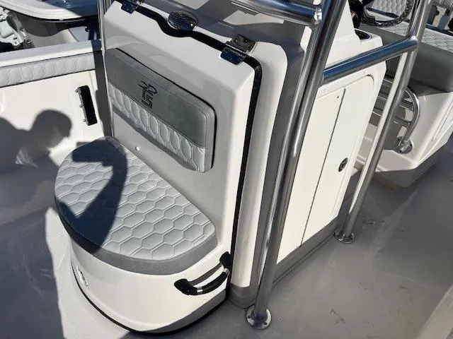 Slide: The Image of 2025 Carolina Skiff 23 LS boat seating and storage area. - 8
