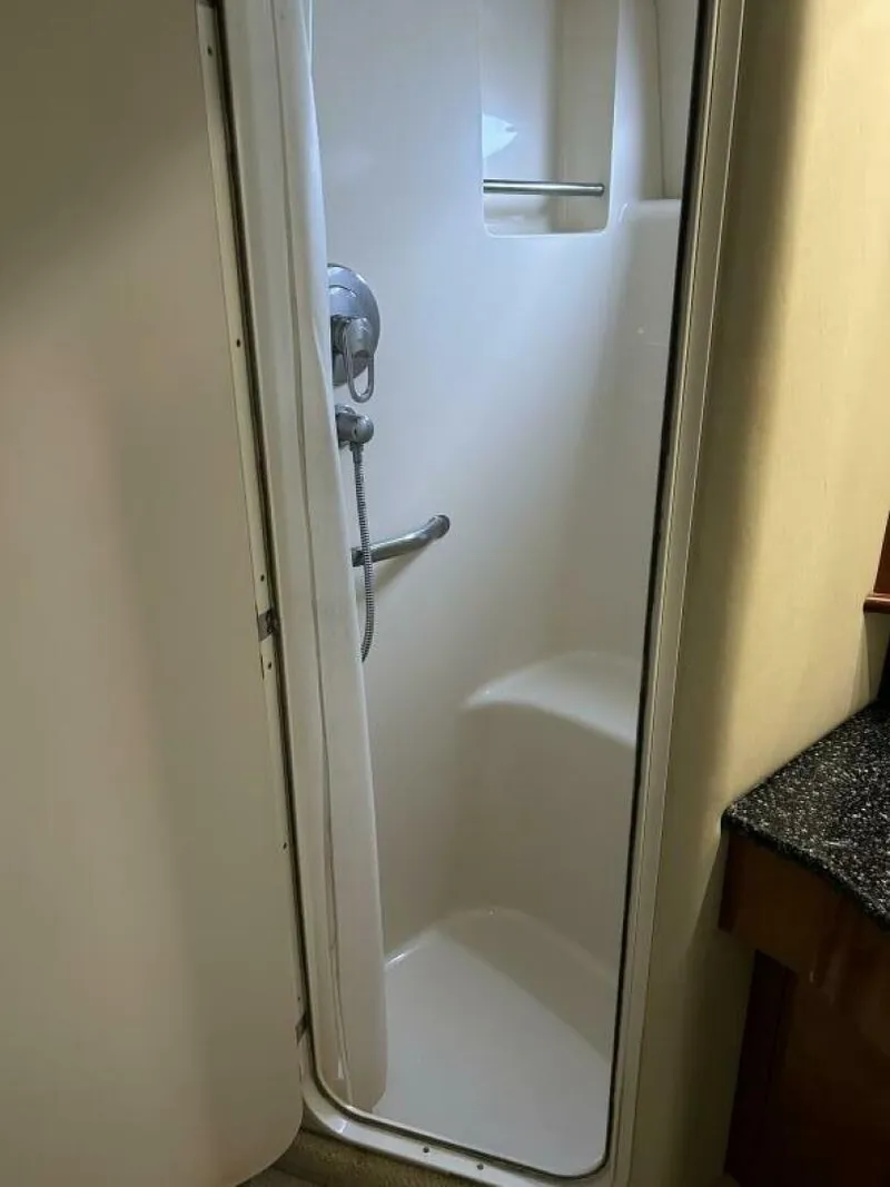 Slide: The Image of Compact shower in 2004 Sea Ray 390 Motor Yacht bathroom. - 27
