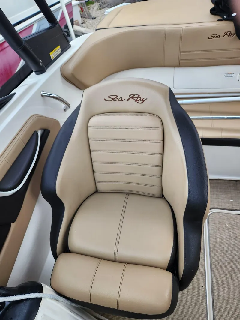 Slide: The Image of 2020 Sea Ray SPX 190 boat seat with beige and black upholstery. - 17