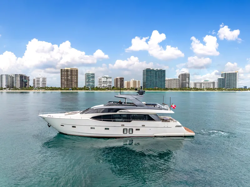 Slide: The Image of 2018 Sanlorenzo SL78 yacht cruising near modern city skyline. - 11