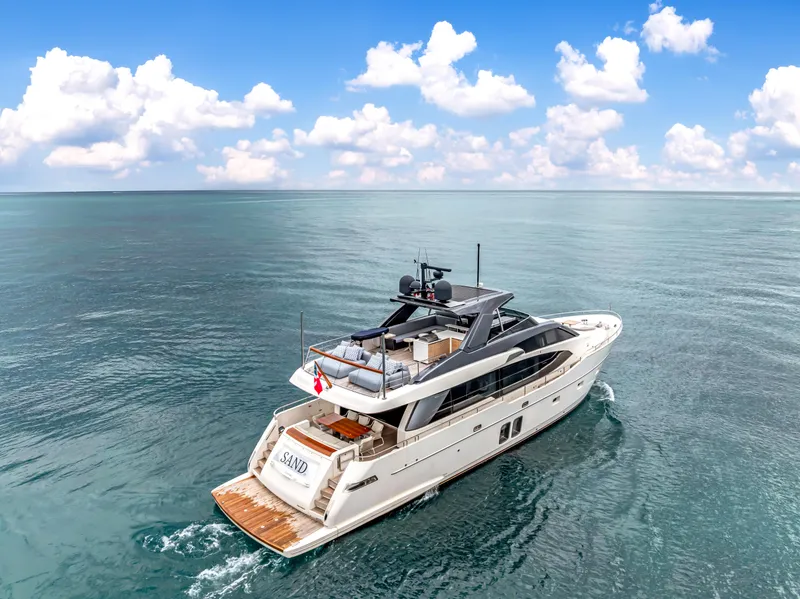 Slide: The Image of Luxurious 2018 Sanlorenzo SL78 yacht cruising on open sea under a clear sky. - 12
