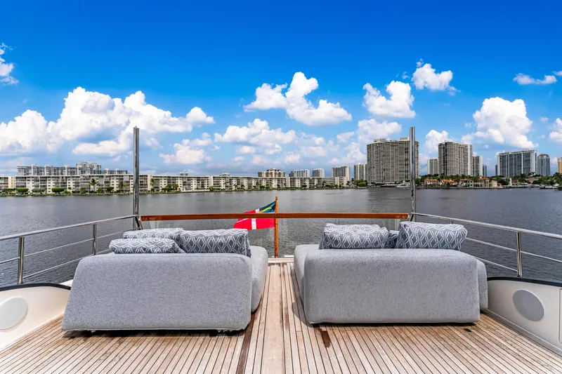 Slide: The Image of Sanlorenzo SL78 yacht deck with city skyline and blue sky, 2018 model. - 20