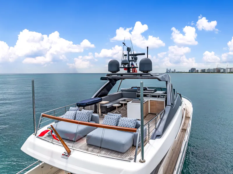 Slide: The Image of Luxurious 2018 Sanlorenzo SL78 yacht on serene ocean with modern deck seating. - 9