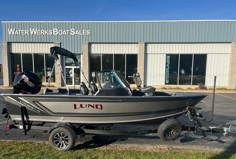 Slide: The Image of 2025 Lund 1775 Impact XS Sport boat at Water Werks Boat Sales dealership. - 2