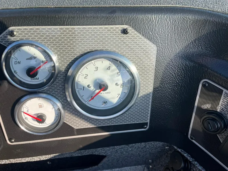 Slide: The Image of Dashboard gauges of 2025 Lund 1775 Impact XS Sport boat. - 20