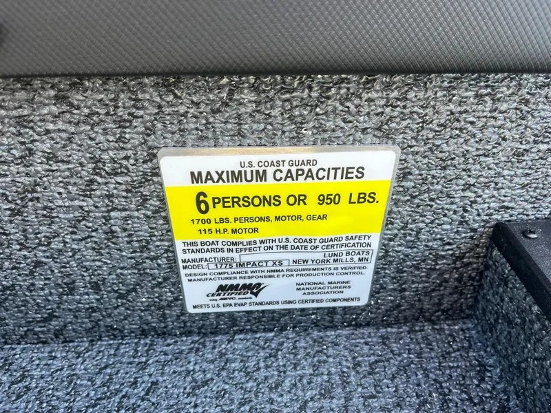 Slide: The Image of Capacity label for 2025 Lund 1775 Impact XS SS boat: 6 persons or 950 lbs. - 26