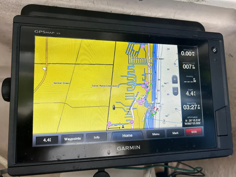 Slide: The Image of Garmin GPSMAP X5 displaying navigation map on 1999 Wellcraft 330 Coastal boat. - 21