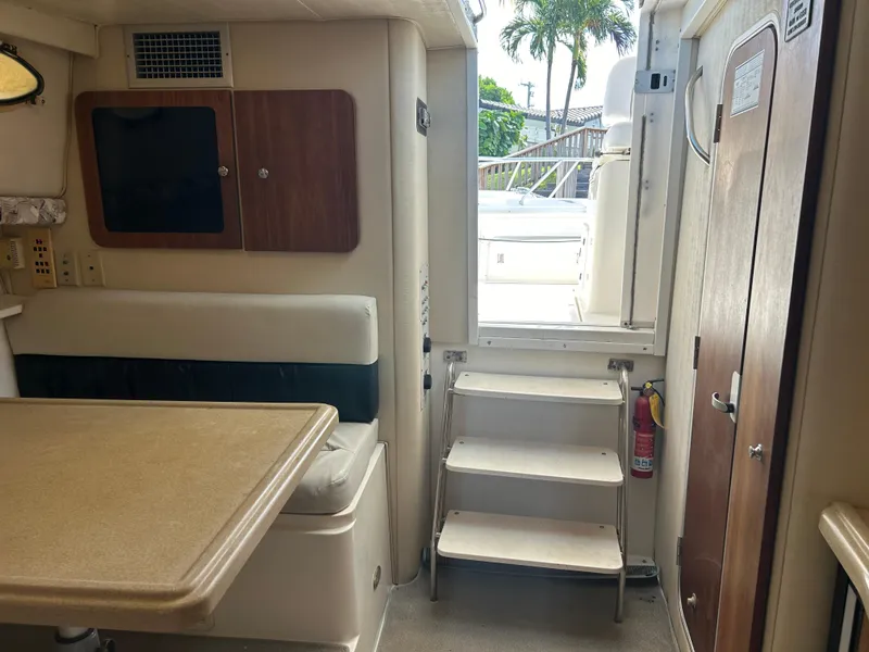 Slide: The Image of Interior of 1999 Wellcraft 330 Coastal boat with seating and stairs. - 43