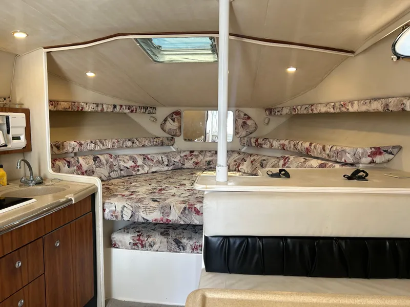 Slide: The Image of Interior of 1999 Wellcraft 330 Coastal boat with cozy cabin and kitchenette. - 44