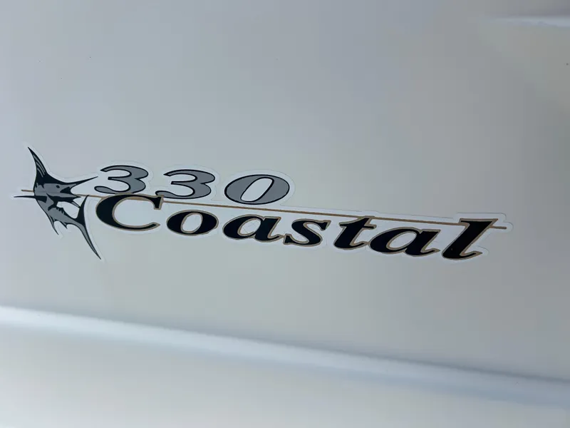 Slide: The Image of Wellcraft 330 Coastal 1999 - 97