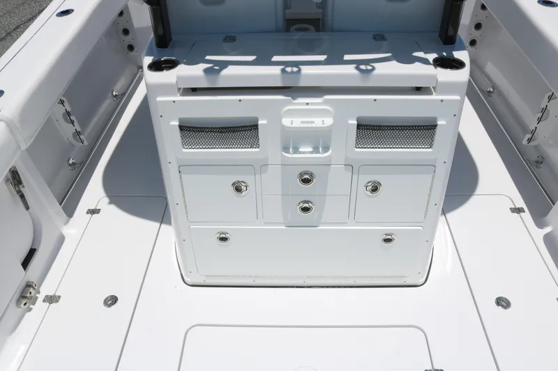 Slide: The Image of 2025 Sportsman Open 282 boat interior with storage compartments and sleek design. - 10