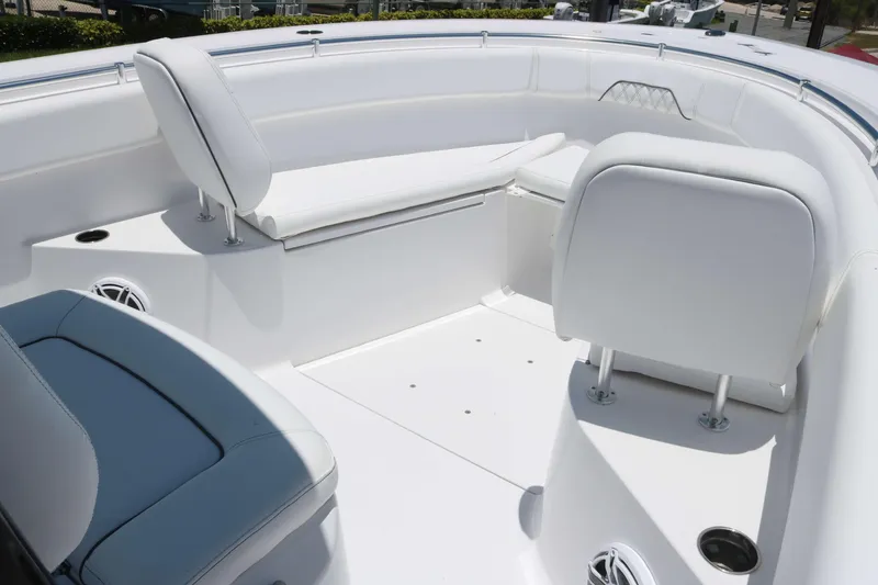 Slide: The Image of 2025 Sportsman Open 282 boat interior with white seating and modern design. - 8
