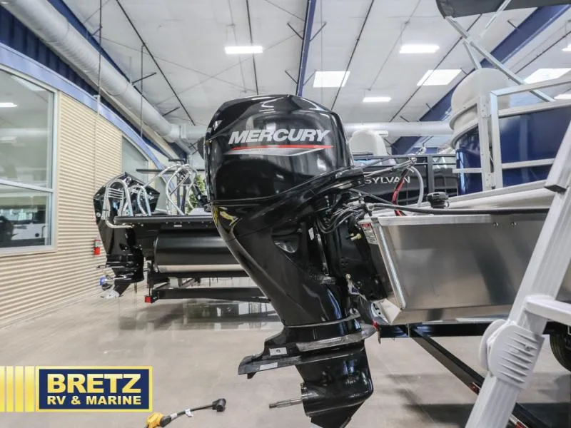 Slide: The Image of Mercury outboard motor on 2025 Vista Fish 18 boat at Bretz RV & Marine showroom. - 18
