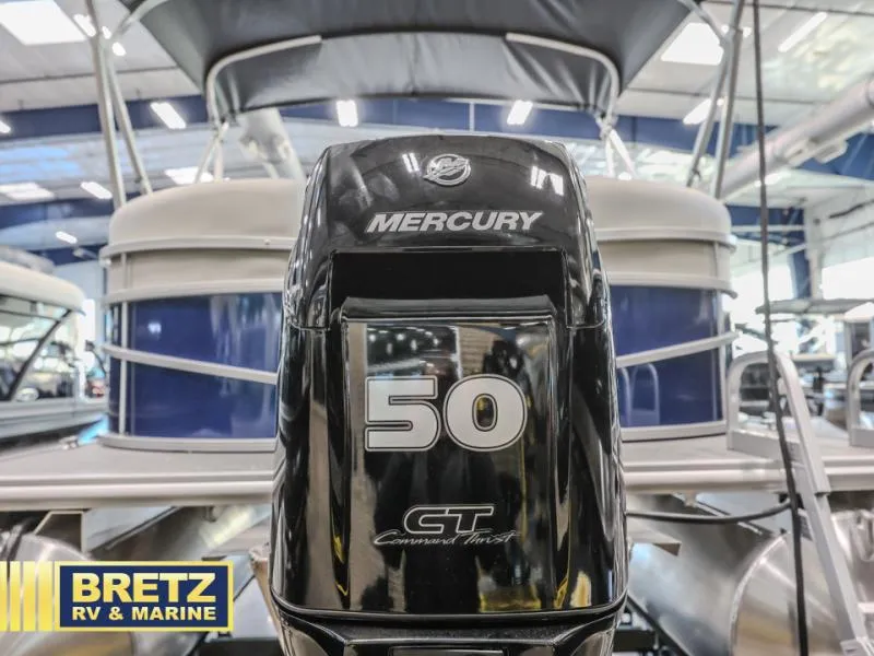 Slide: The Image of Outboard motor on a 2025 Vista Fish 18 boat at Bretz RV & Marine showroom. - 21