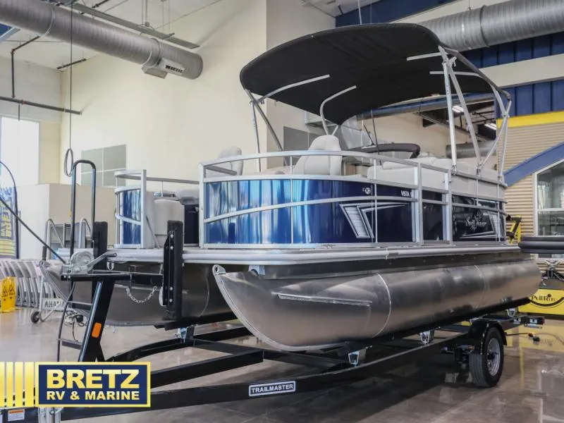 Slide: The Image of 2025 Vista Fish 18 pontoon boat on trailer at Bretz RV & Marine showroom. - 3