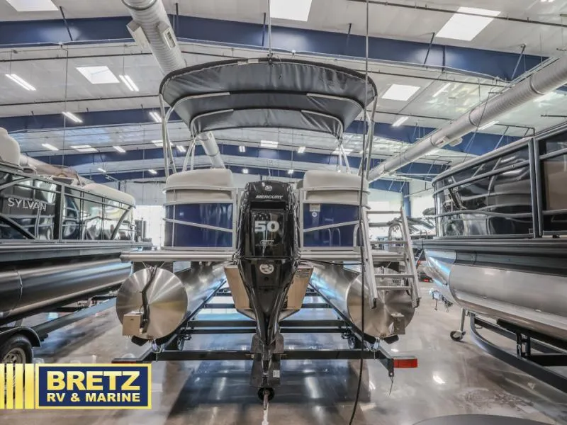 Slide: The Image of 2025 Vista Fish 18 pontoon boat displayed at Bretz RV & Marine showroom. - 5