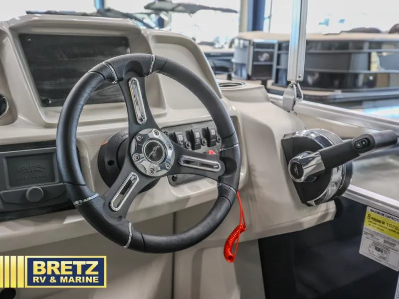 Slide: The Image of Steering wheel and controls of 2025 Vista Fish 18 boat at Bretz RV & Marine. - 9