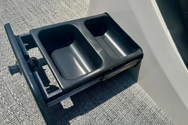 Slide: The Image of Barletta C22UC 2025 boat cup holder on textured surface, featuring dual compartments. - 18