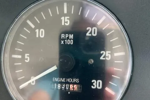 Slide: The Image of Close-up of Tiara Yachts 3700 Open tachometer showing RPM and engine hours. - 10