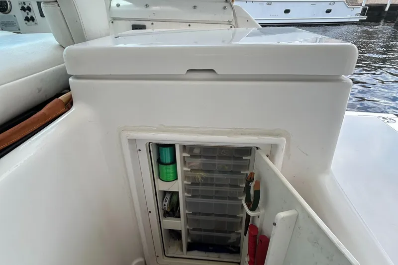 Slide: The Image of Tiara Yachts 3700 Open 2000 model with open storage compartment on deck. - 12