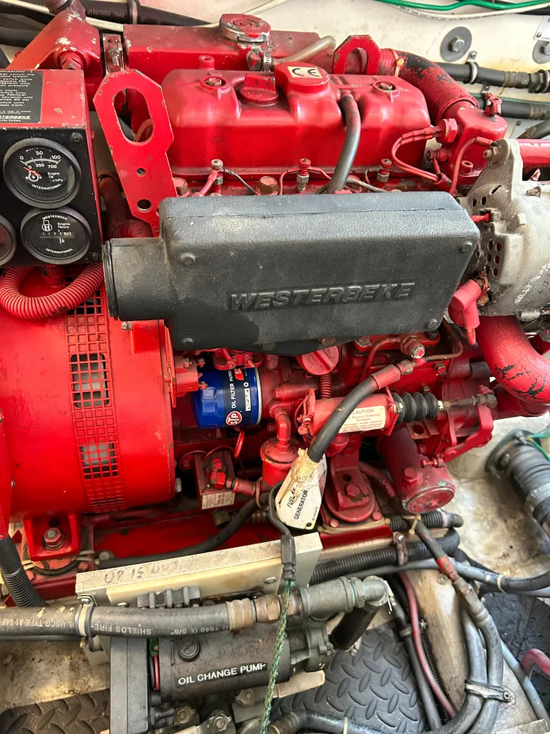 Slide: The Image of Red Westerbeke engine in a 2000 Tiara Yachts 3700 Open. - 14