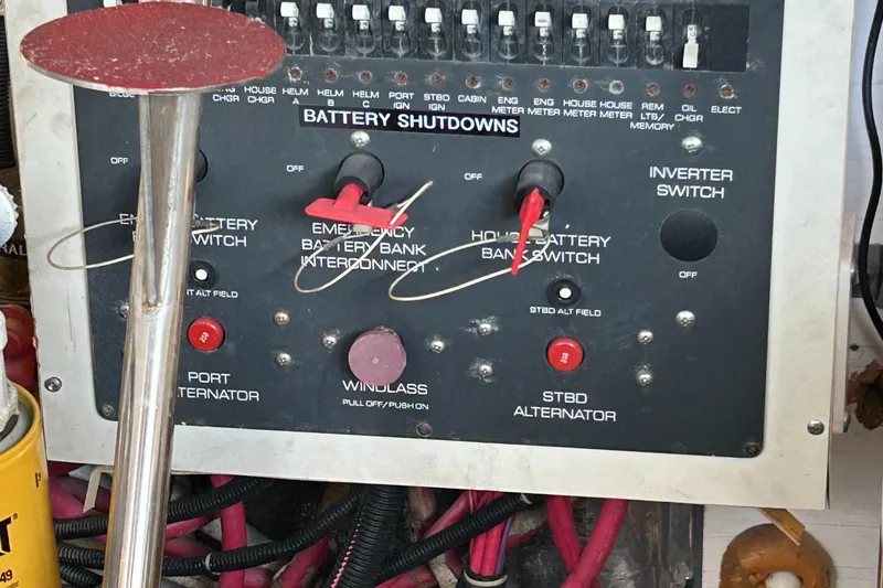 Slide: The Image of Control panel of a 2000 Tiara Yachts 3700 Open, featuring battery shutdown switches. - 17
