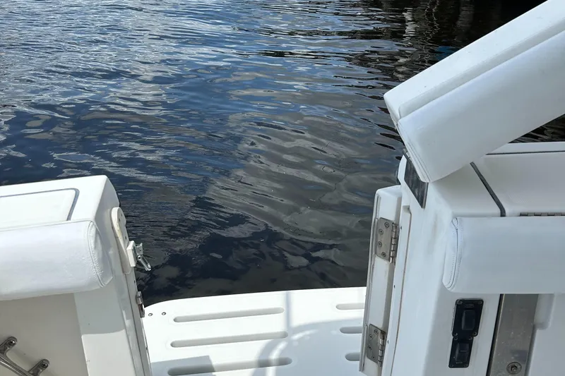 Slide: The Image of Tiara Yachts 3700 Open 2000 model, white deck, near water. - 19