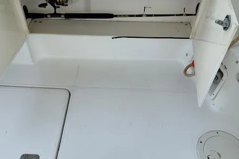 Slide: The Image of Tiara Yachts 3700 Open 2000 model, interior deck view with storage compartments. - 25