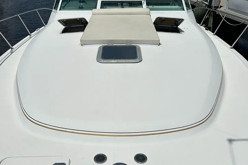 Slide: The Image of 2000 Tiara Yachts 3700 Open deck with sunpad and hatches. - 27