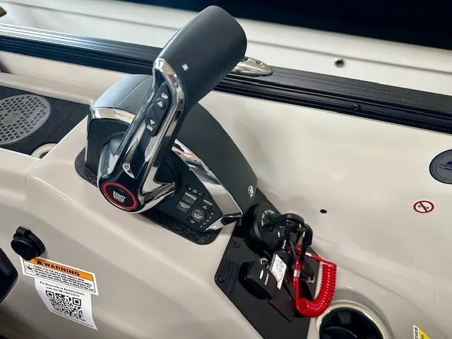 Slide: The Image of Throttle control panel of 2025 Barletta C22UC boat, featuring modern design and safety features. - 4