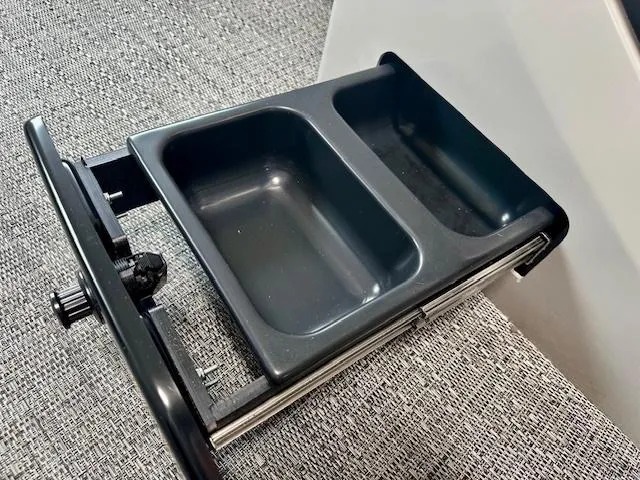 Slide: The Image of Barletta C22UC 2025 model cup holder with dual compartments on textured surface. - 9