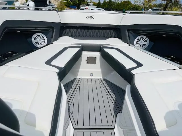 Slide: The Image of 2019 Monterey 298 Super Sport boat interior with sleek seating and modern design. - 12