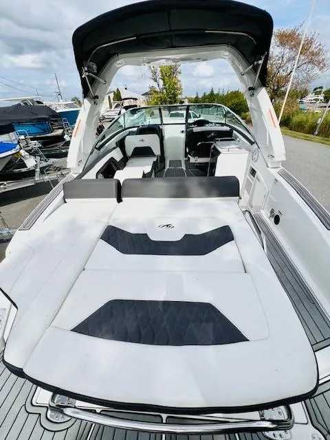 Slide: The Image of 2019 Monterey 298 Super Sport boat with spacious seating and sleek design. - 15