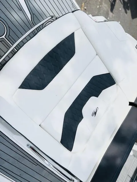 Slide: The Image of White and black seating on 2019 Monterey 298 Super Sport boat. - 2