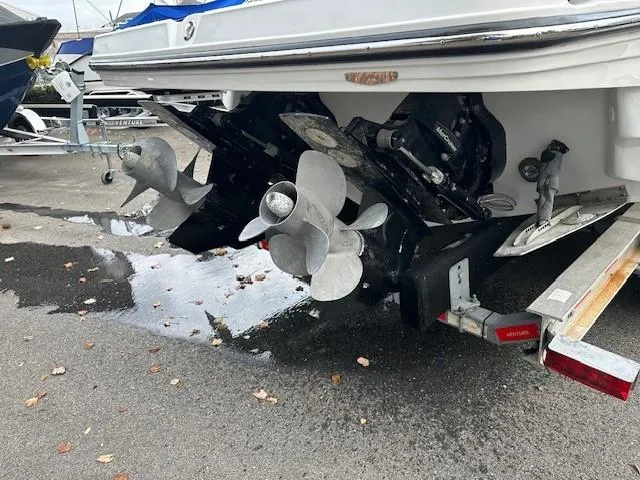 Slide: The Image of 2019 Monterey 298 Super Sport boat with dual propellers on a trailer. - 22