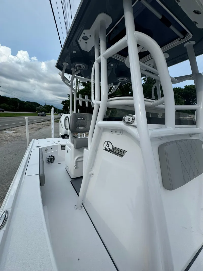 Slide: The Image of 2025 Blazer 2700 Hybrid Bay with Tower, sleek design, white exterior, modern features. - 10