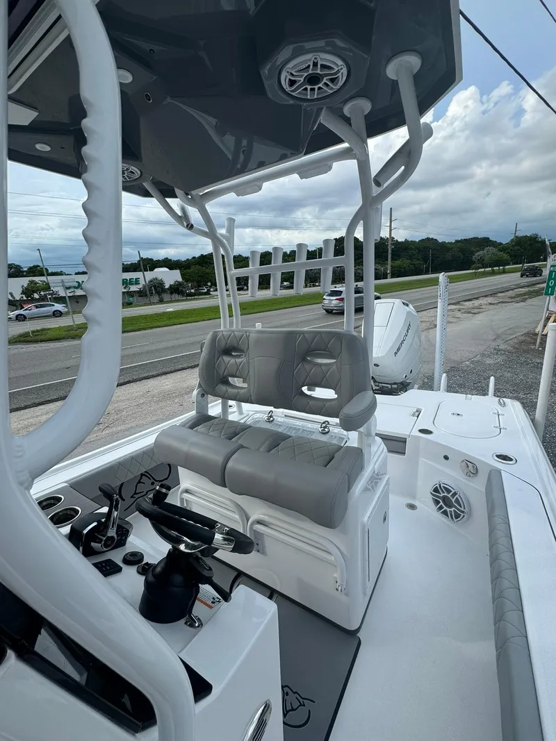Slide: The Image of 2025 Blazer 2700 Hybrid Bay with tower, featuring modern seating and controls. - 8