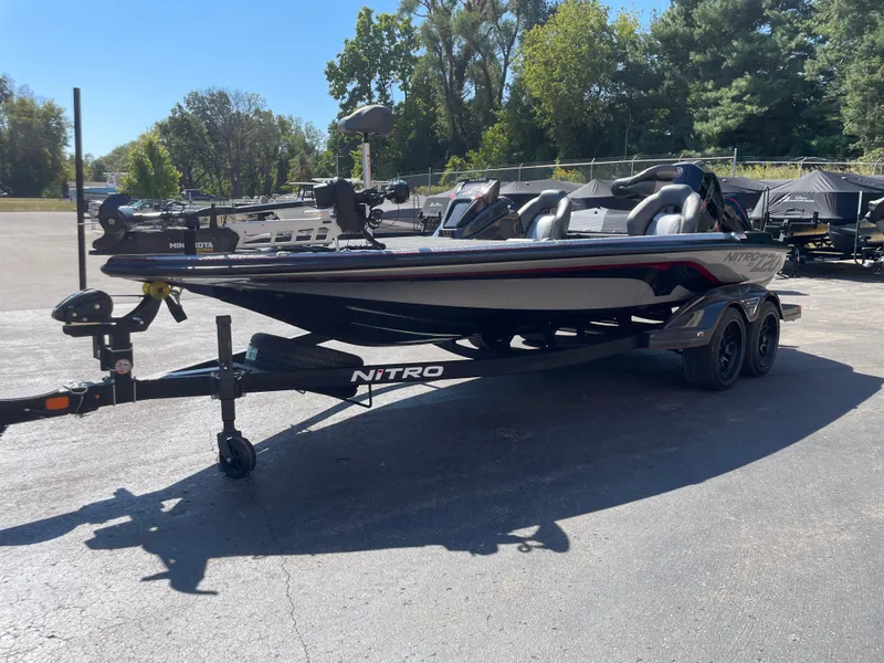 Slide: The Image of 2025 Nitro Z20 XL Pro boat on trailer in sunny outdoor setting. - 4