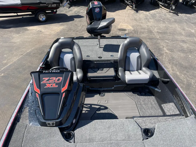 Slide: The Image of 2025 Nitro Z20 XL Pro boat interior with dual seats and sleek design. - 7