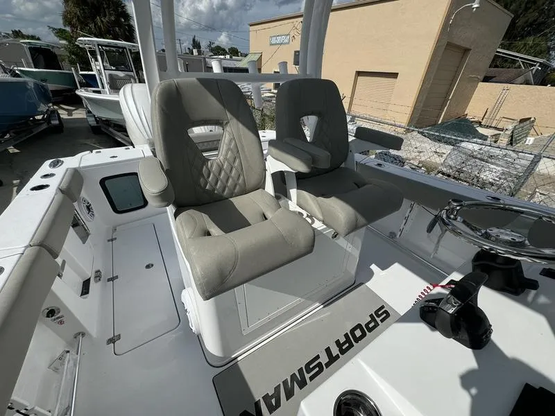 Slide: The Image of 2025 Sportsman Open 282 boat with plush seating and modern design. - 22