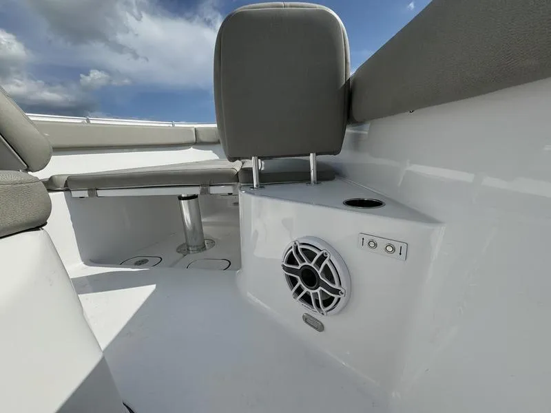 Slide: The Image of 2025 Sportsman Open 282 boat interior with seating and speaker system. - 37