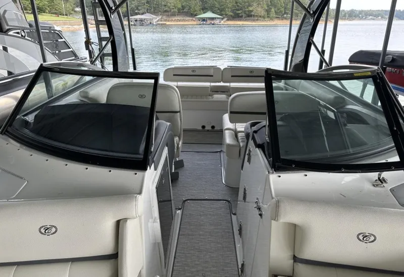 Slide: The Image of 2022 Cobalt R30 boat interior with open seating and lake view. - 12