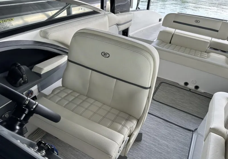 Slide: The Image of 2022 Cobalt R30 boat interior with plush seating and modern design. - 13