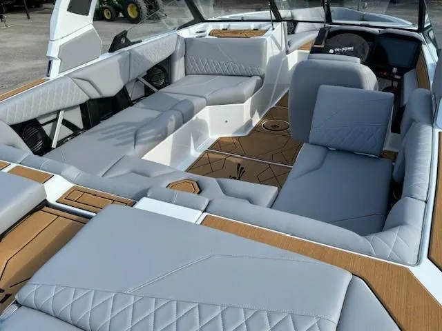 Slide: The Image of 2025 Tigé Z1 boat interior with luxurious seating and modern dashboard design. - 15