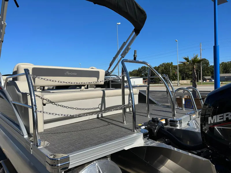 Slide: The Image of 2024 Barletta A20UC pontoon boat with sleek design and modern features. - 10